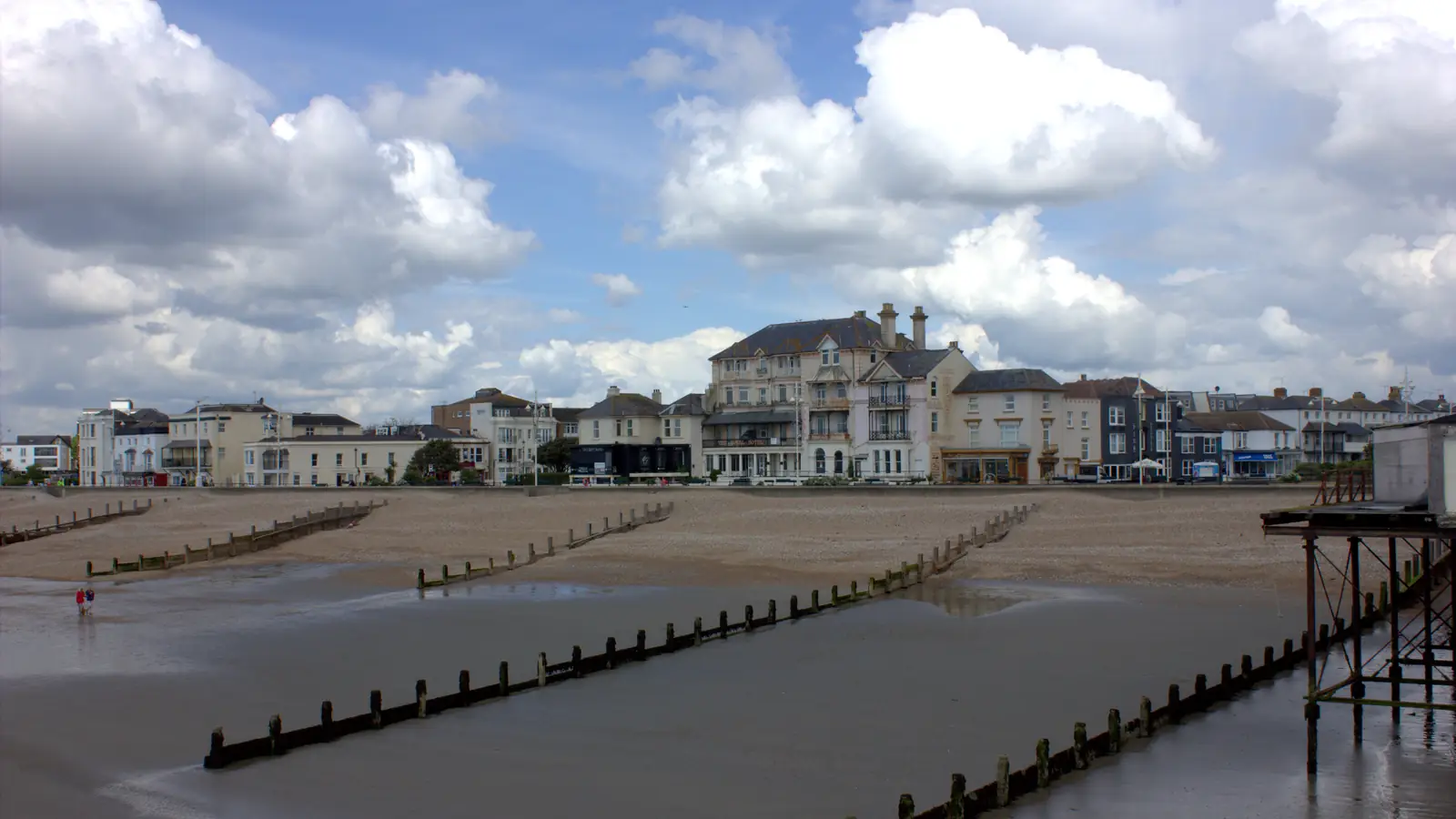 Bognor Regis seafront looking west along the beach towards the white Regency terraces