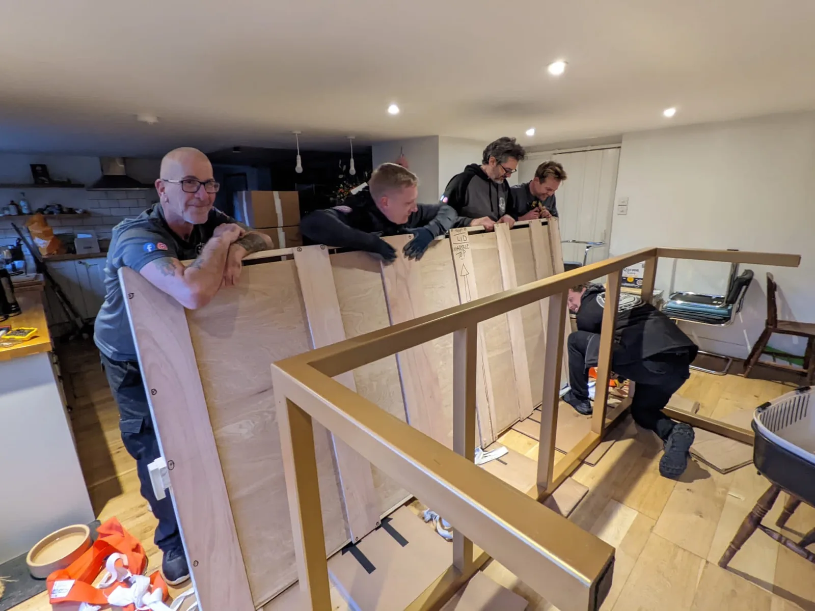 Carrying furniture up a staircase