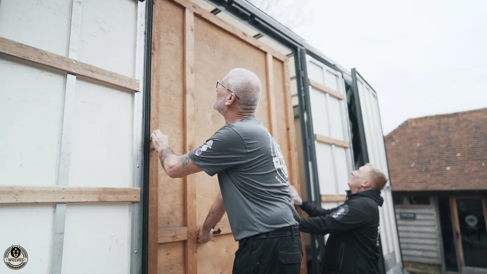 Loading wrapped panels into a storage container in Horsham, West Sussex