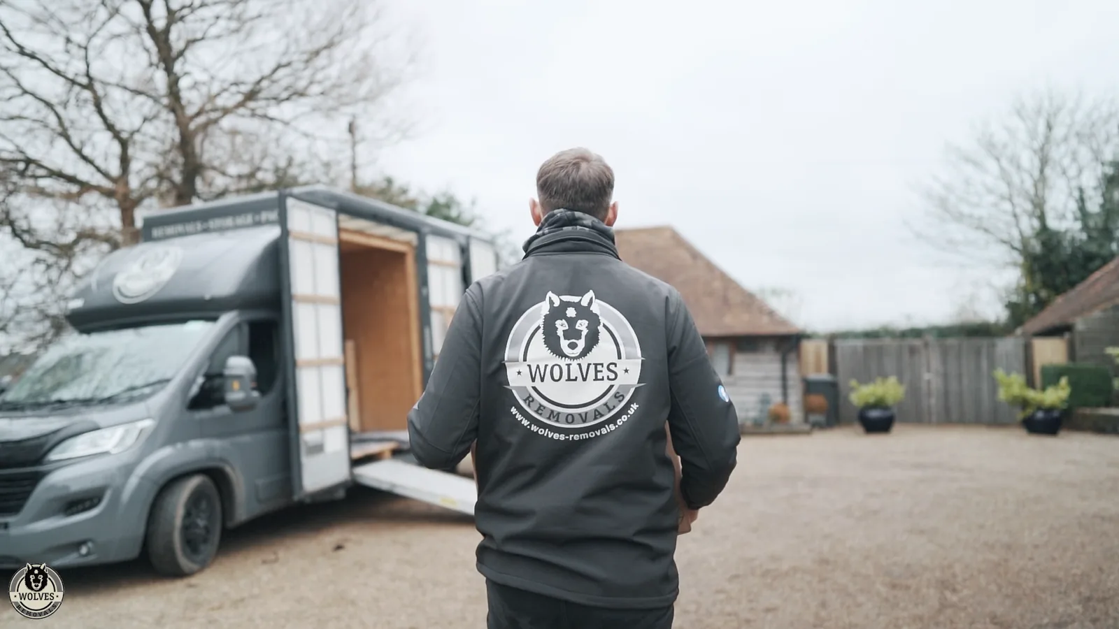 Mover walking to van barn