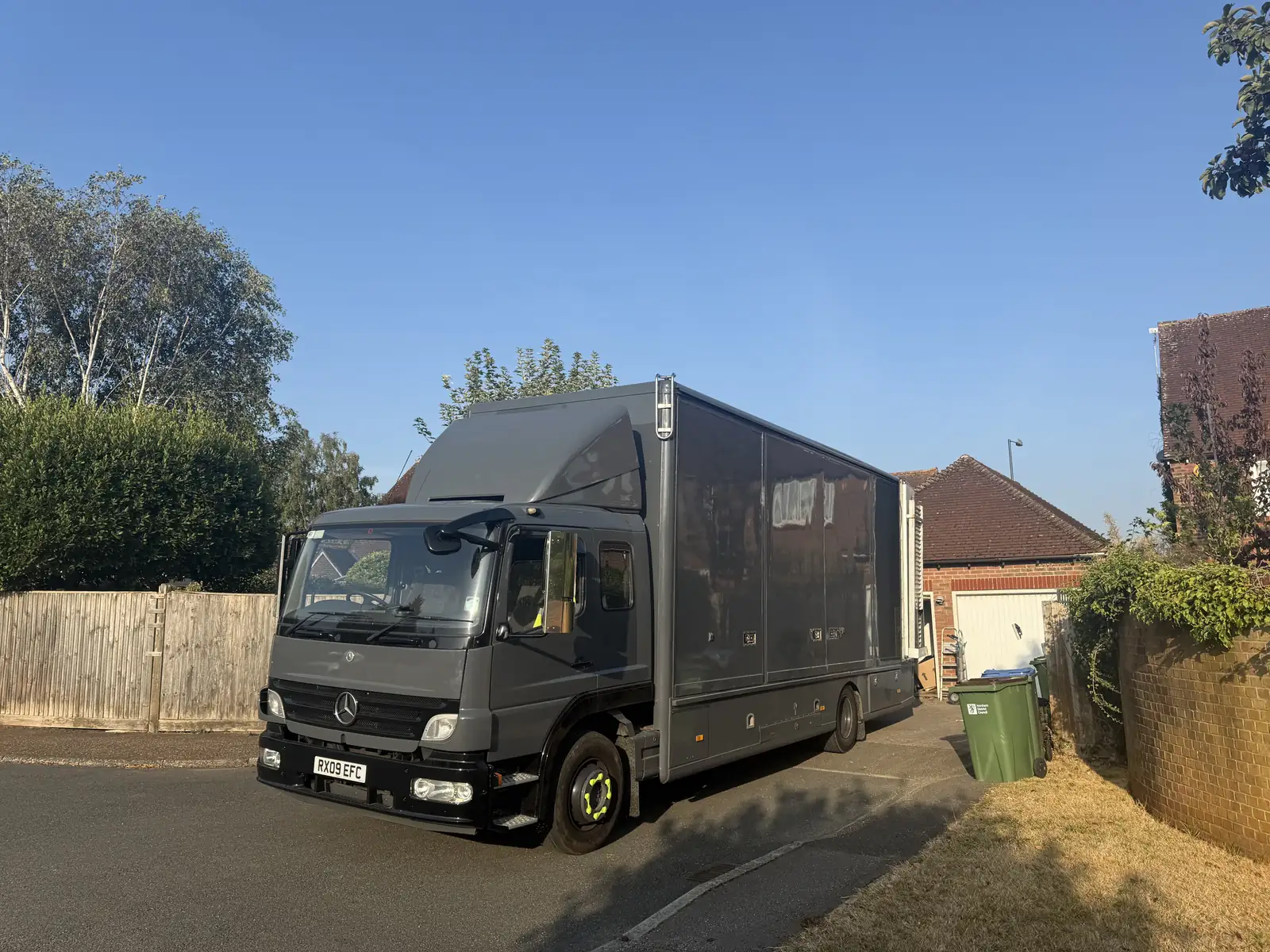 Wolves Removals lorry parked on a residential street in Ashington on collection morning