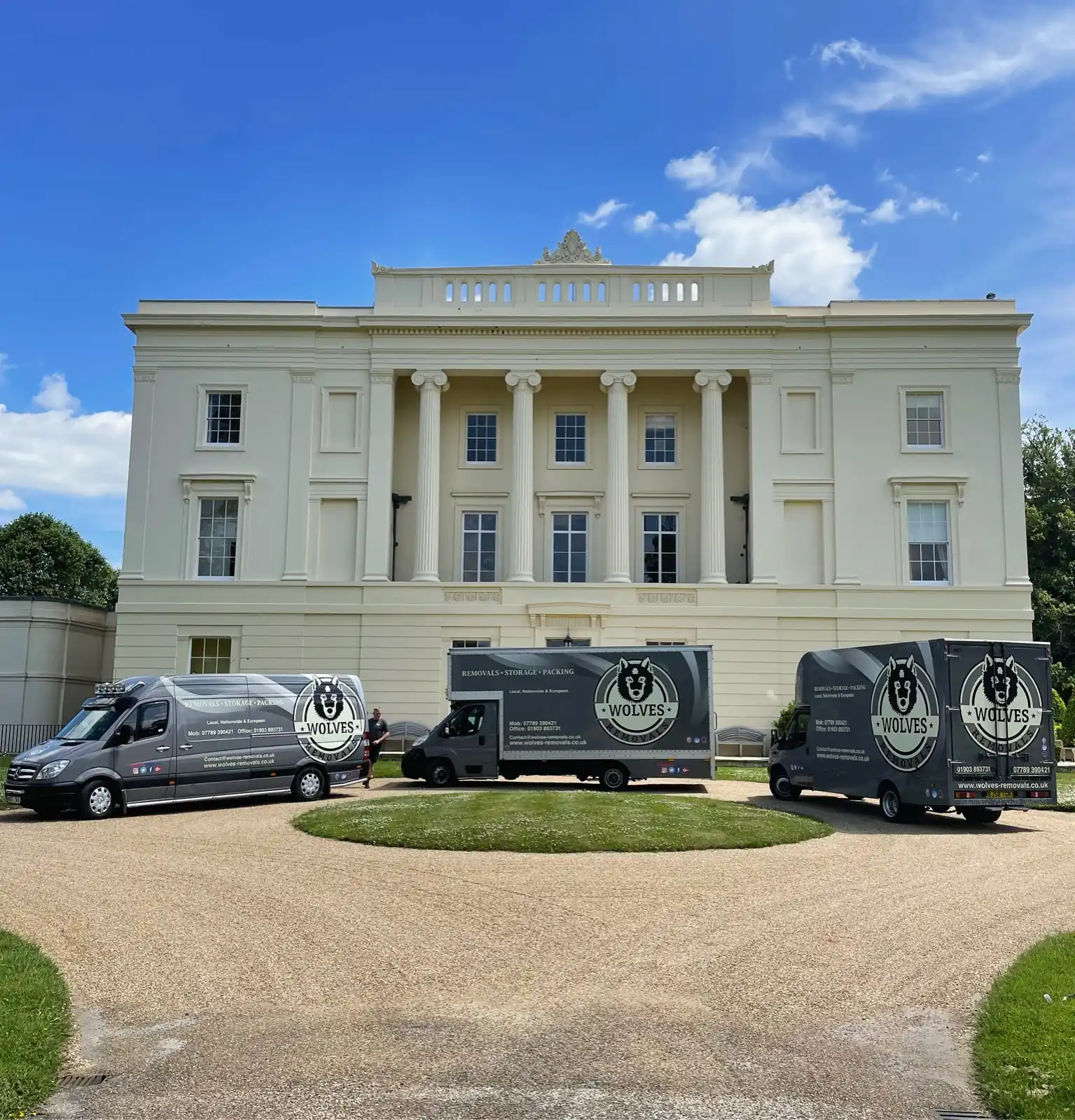 Removal vans at a stately home in Hampshire