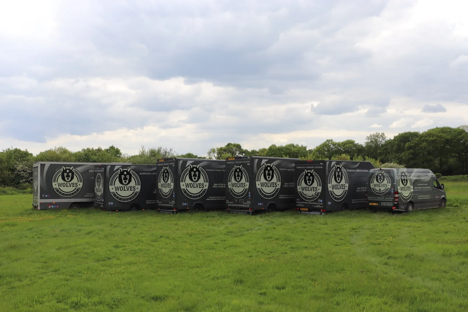Storage containers lined up in a field