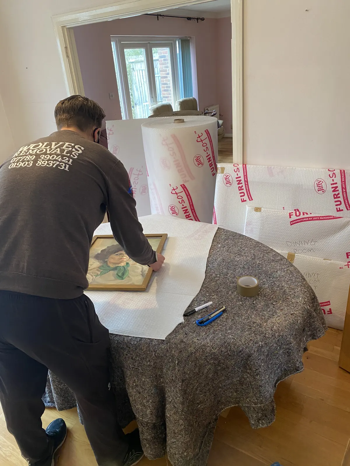 Wrapping a bronze bust sculpture for a Shoreham-by-Sea removal