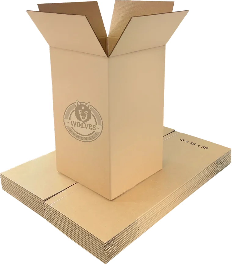 Extra large double-walled moving box on a stack of flat-packed cartons